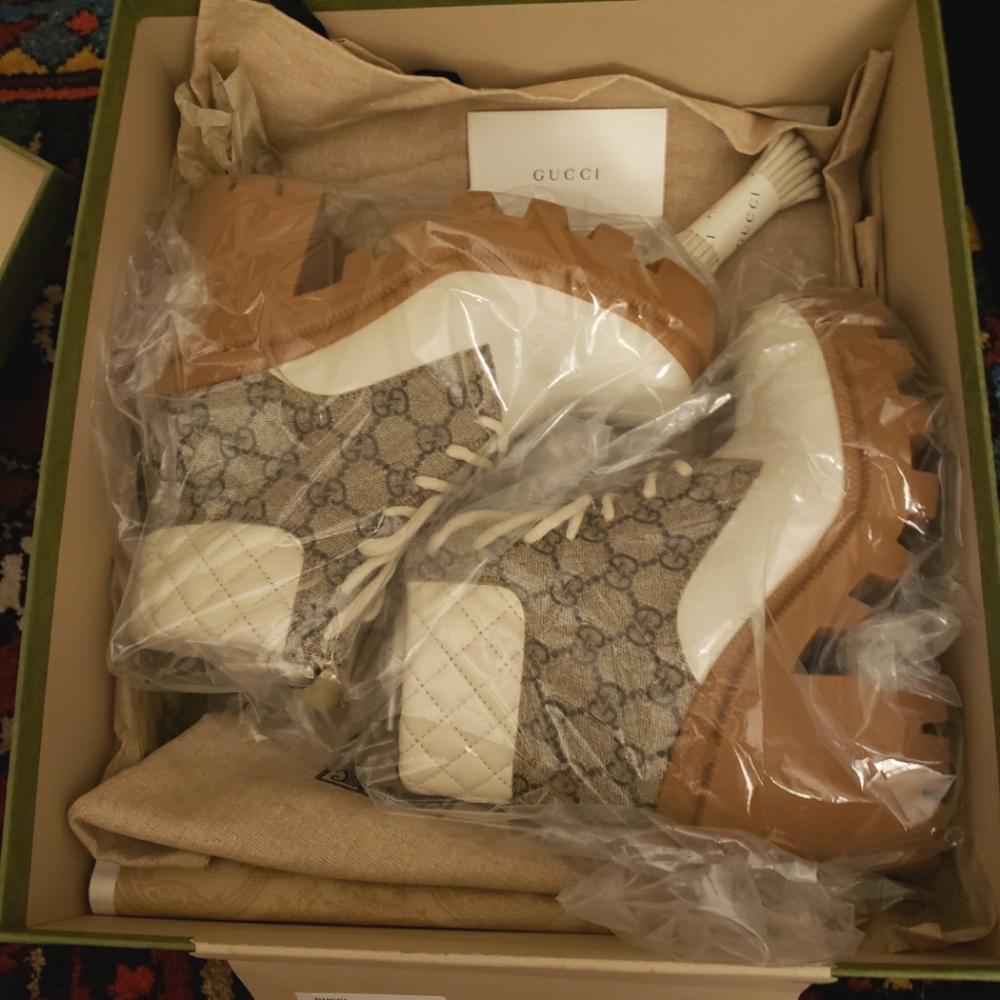 Gucci Monogram Ebony combat boots recently listed on TheRealReal